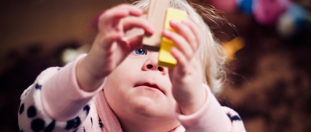 Toddler with building blocks