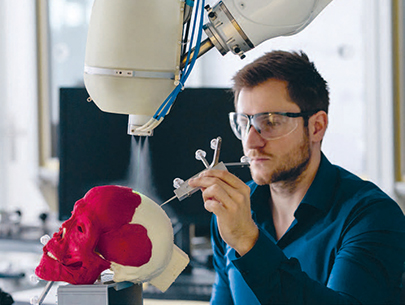 A robot named «Carlo»: The Computer Assisted Robot-guided Laser Osteotome cuts bone extremely precisely. A robot named «Carlo»: The Computer Assisted Robot-guided Laser Osteotome cuts bone extremely precisely.