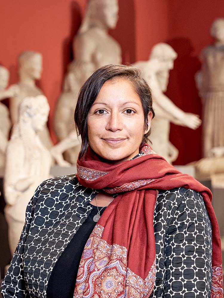 Dr. Nandini Pandey, classic statues in the background Dr. Nandini Pandey, classic statues in the background