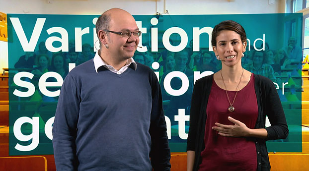 Dr. Marc Creus (University of Basel) and Karen Lavi (Friedrich Miescher Institute) standing in front of a digital whiteboard – a situation which will also be typical for the courses to be available on FutureLearn by the end of 2015. (Video still: University of Basel, New Media Center)