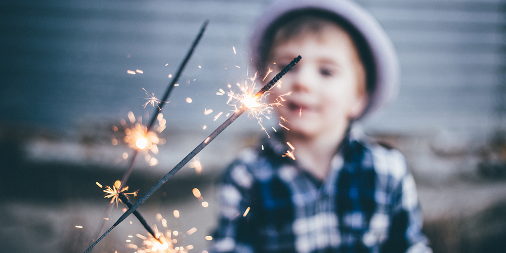 small boy with fireworks