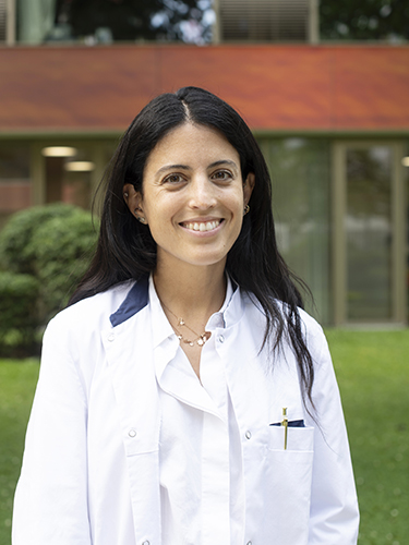 Chiara Minotti in a white lab coat Chiara Minotti in a white lab coat