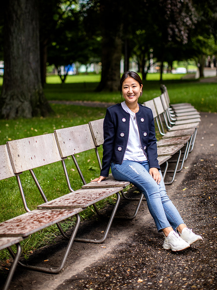 Jacqui Cho sits on a bench. Jacqui Cho sits on a bench.