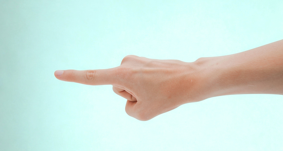 Ein Zeigefinger wird in den Raum gestreckt als Zeichen von: Aggressivität.