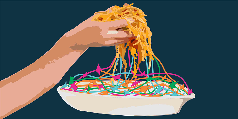 A hand holds a lump of spaghetti